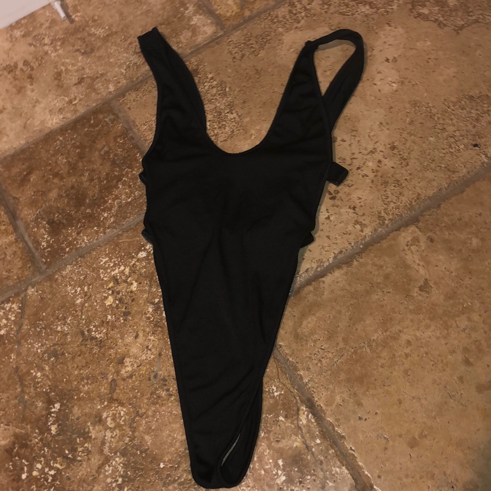 Black buckle body suit